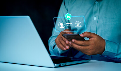 Fototapeta premium Secure digital payment authentication using smartphone and laptop with virtual interface showing verified transaction and banking icon, fintech security, online banking, cashless business technology