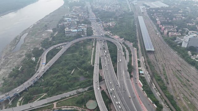 Aerial view of Running Traffic on flyover road near Majnu ka Tilla, New Delhi, India
