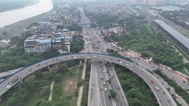 Aerial view of Running Traffic on flyover road near Majnu ka Tilla, New Delhi, India
