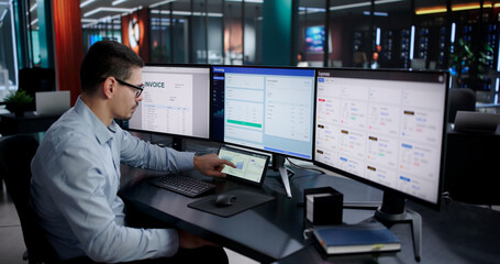 Male Financial Accountant And Analyst Checking Charts