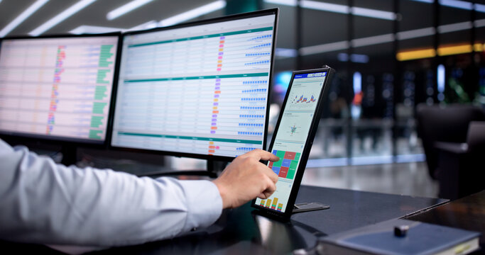 Hispanic Accountant Analyzing Financial Data