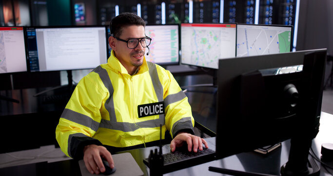 911 Operator Assisting Emergency Calls In Dispatch Center