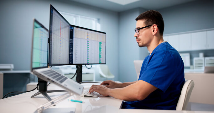 Hispanic Doctor Using Spreadsheet