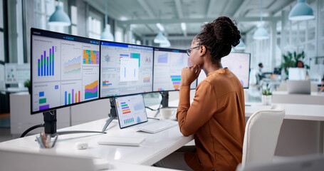 Business Analyst Examining Market Data