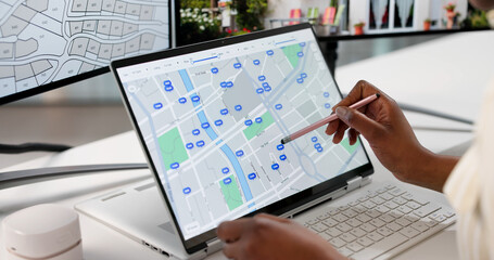 Young Female Real Estate Planner Searches