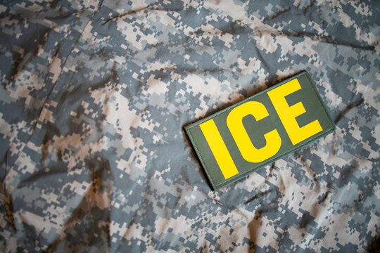 ICE patch with a army background.