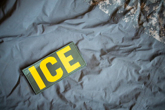 Detail of an ICE patch on gray background.