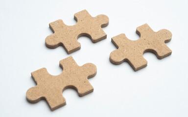 Fototapeta premium Puzzle background. Puzzle pieces on white background