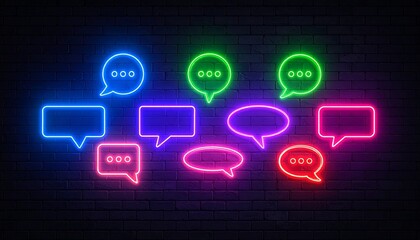 Neon speech bubbles with typing dots on dark brick wall