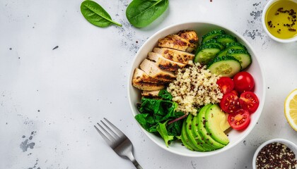 Healthy Grilled Chicken Quinoa Bowl with Fresh Vegetables and Avocado