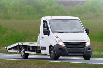 Fototapeta premium Tow truck providing roadside emergency assistance