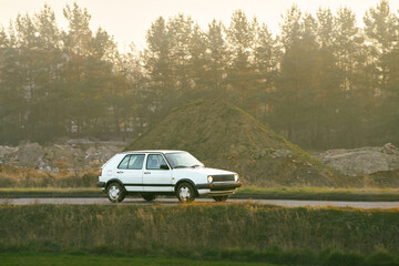 Classic car driven in rural area