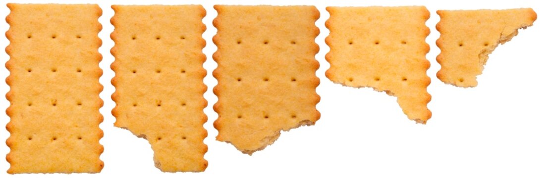 Isolated set of whole and biten biscuits on a white background	