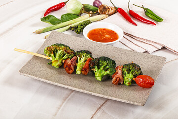 Thai Street foof satay with bacon and broccoli