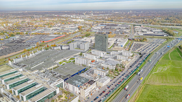 VELDHOVEN, THE NETHERLANDS &mdash; NOV 06 2025: Aerial drone view of ASML headquarters, high-tech Dutch company, manufacturer and supplier of lithographic machines for semiconductor industry