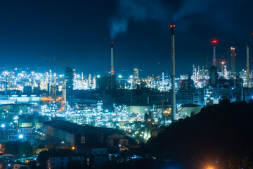Oil refineries at night, and the lights from production.