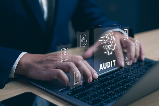 AI audit concept ,businessman working on laptop with artificial intelligence interface, representing digital compliance, automated auditing,data analysis, corporate governance and business technology