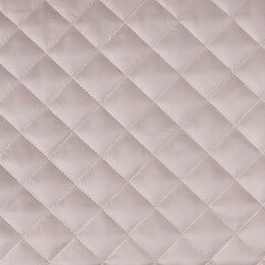 Naklejka premium Light pink velvet quilted fabric texture with diamond stitching
