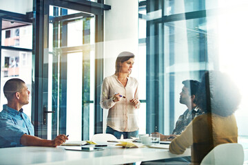 Boardroom, meeting and presentation with designer people in workplace together for coaching or...