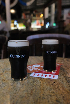 Belfast, Northern Ireland. October 7th 2025. Pints of Guinness on Granite Table inside a Belfast Pub
