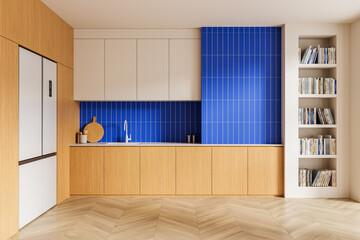 Modern kitchen interior with wooden cabinets, blue tile backsplash, and built-in bookshelf on beige background. Minimalist home design concept. 3D Rendering