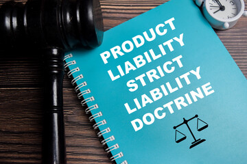 Concept of product liability strict liability doctrine write on book isolated on Wooden Table. For...