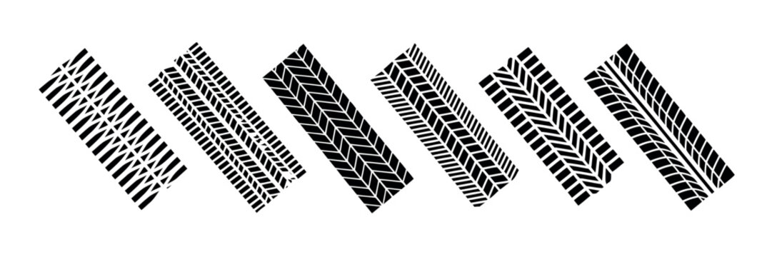 Tire Marks Skid Track Vector Design featuring realistic black tire tread silhouettes isolated on a white background
