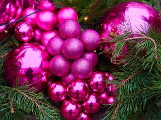 Christmas Texture or background of bright pink balls. Greeting or postcard