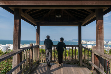 Japanese couple view Fukuoka view at Hakata port from Nishi park