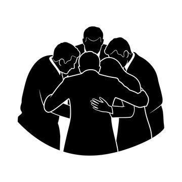 Group of people huddled together in a circle of support and unity.