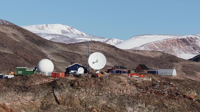 Satellite dishes receive communications for Greenland.
