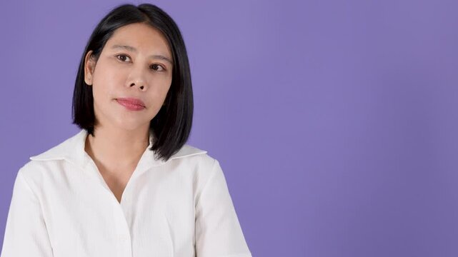 Asian Woman Looking Up With Thinking and Serious Discontent Expression