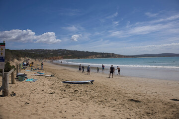 Sandy beach with beachgoers, South Australia.