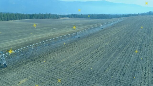 Animation of stars falling over agriculture fields
