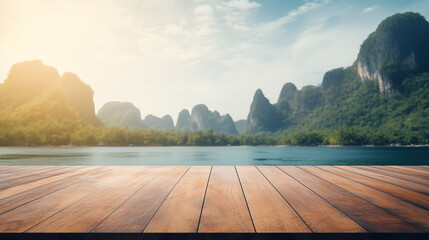 Empty wooden tabletop in front of dramatic limestone karst cliffs rising from tropical turquoise sea