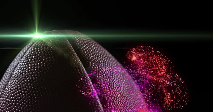 Animation of cropped rugby ball, flying lens flare and abstract pattern against black background