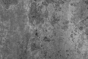 Grunge gray concrete wall texture background with stains cracks and distressed surface