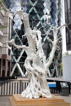 Tree artwork "Summer Moon" by Ugo Rondinone in front of the Gherkin, City of London