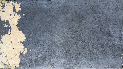 Obraz premium Dark blue painted texture background with circular brush marks and peeling edge