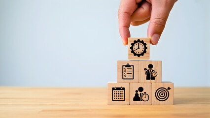 Optimizing Business Success Hand Stacking Strategic Planning Blocks for Efficient Time Management and Goal Achievement in Project Execution