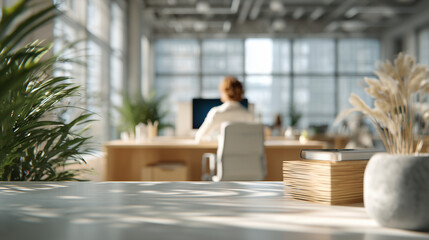 A realistic and professional office interior featuring the back of a businesswoman working at a desk with a monitor, surrounded by lush green plants in a bright, modern workspace.