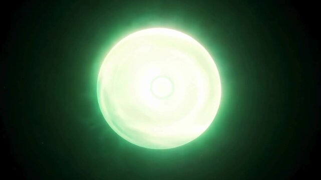 Intense bright green energy ball or star glowing and pulsing in the center of a black screen.