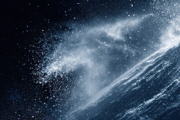 Obraz premium Abstract snow spray texture on a dark background, evoking frozen winter scenes and crisp atmospheric effects.