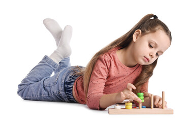 Cute little girl playing with stacking and counting game on white background