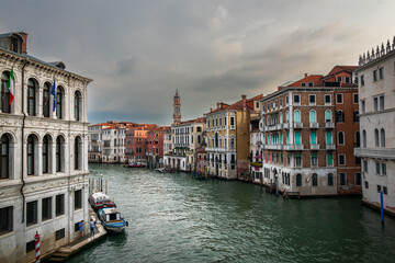 View of the Grande Canal in Venice in Italy surrounded by beautiful old buildings. A very popular tourist destination in the Veneto region.