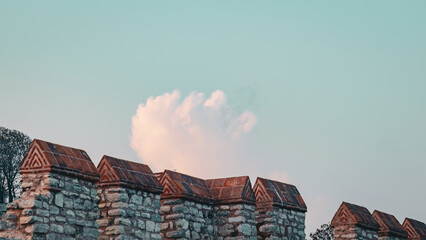 Historic stone walls with clouds above old city in Istanbul