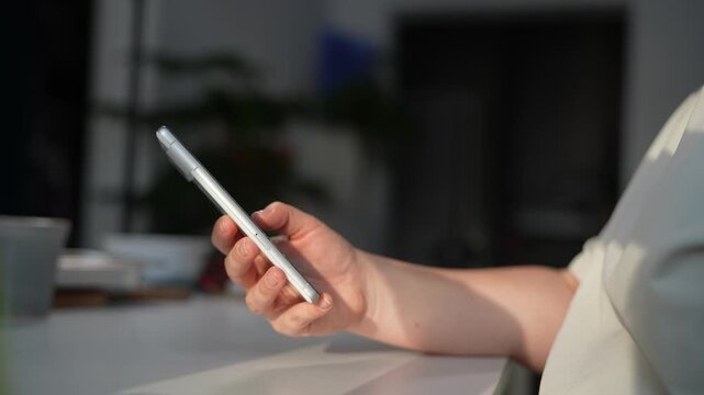 Phone used on a white table
