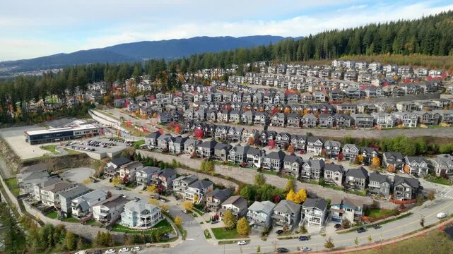 A Large Residential Neighborhood Spreads Across the Hills, Showing the Coquitlam Housing Development on Burke Mountain in Canada - Aerial Drone Shot