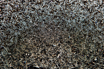 Industrial background with metallic filings