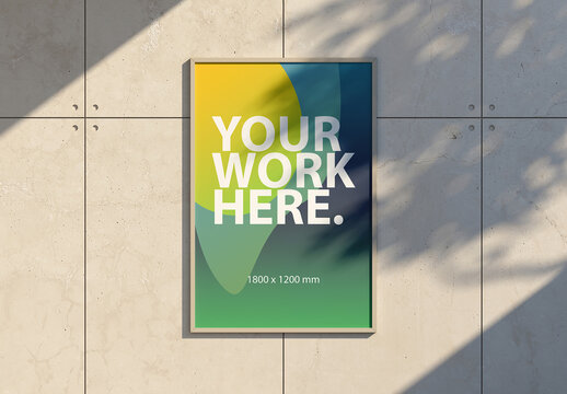 Framed Poster on a concrete wall Mockup